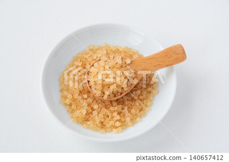 Coarse sugar in a small dish Coarse sugar in a small dish 140657412