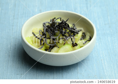 Celery and salted kelp tossed in sesame oil Celery and salted kelp tossed in sesame oil 140658619