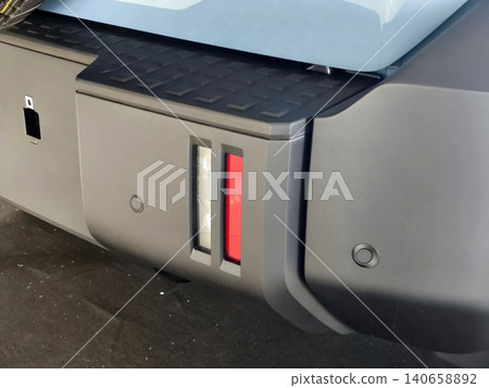 Close-up of Modern Car Bumper with Lights 140658892