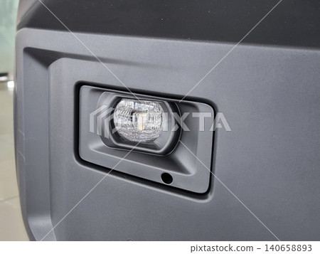 Close-up of a Car Fog Light 140658893