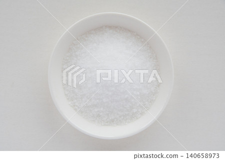 Citric acid in a small dish Citric acid in a small dish 140658973