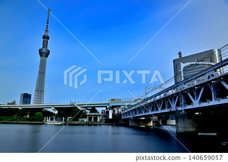 A long-exposure shot of Tokyo Skytree and Sumida River Walk as seen from the Sumida River Terrace. A long-exposure shot of Tokyo Skytree and Sumida River Walk as seen from the Sumida River Terrace. 140659057