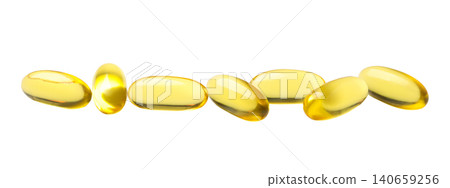 Golden omega fish oil capsules lay in a clean, organized line, PNG Golden omega fish oil capsules lay in a clean, organized line, PNG 140659256