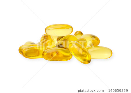 Yellow capsules are stacked together showcasing benefits of omega supplements, PNG 140659259