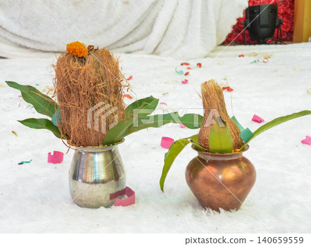 copper and steel kalash coconut mango leaves copper and steel kalash coconut mango leaves 140659559