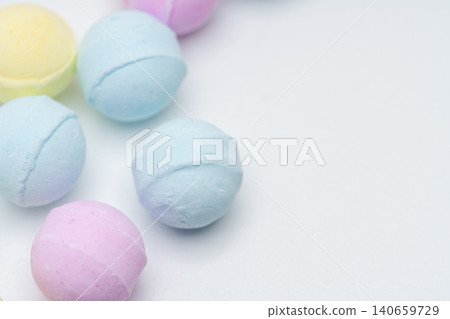 The light blue and pink color scheme conveys the texture of the ramune candy, which is a food product. The light blue and pink color scheme conveys the texture of the ramune candy, which is a food product. 140659729