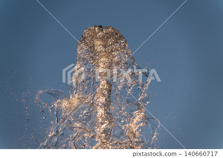 Splashes and jets of water against light background. Splashes and jets of water against light background. 140660717