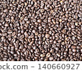 Macro shot of roasted dark roast Robusta coffee beans texture 140660927