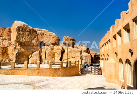 Courtyard and traditional architecture at the Land of Civilizations tourist site at Al Qarah Mountain in Al Ahsa, Saudi Arabia. Courtyard and traditional architecture at the Land of Civilizations tourist site at Al Qarah Mountain in Al Ahsa, Saudi Arabia. 140661153