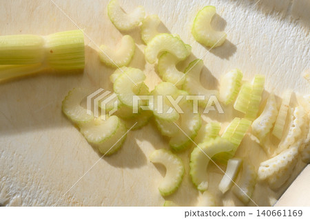 Celery chopped on a cutting board Celery chopped on a cutting board 140661169