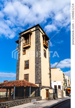 The historic Torreon de Ventoso lookout tower stands under a blue sky in Puerto de la Cruz, Tenerife, Canary Islands, Spain. The historic Torreon de Ventoso lookout tower stands under a blue sky in Puerto de la Cruz, Tenerife, Canary Islands, Spain. 140661214
