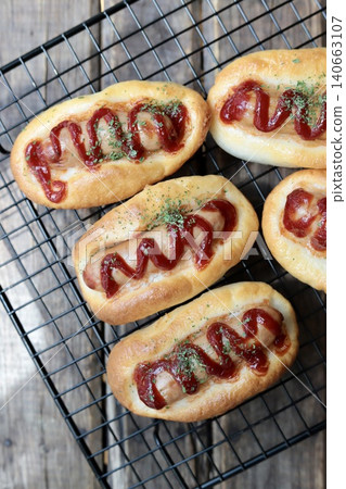 Gluten-free sausage bread made with rice flour bagel dough Gluten-free sausage bread made with rice flour bagel dough 140663107
