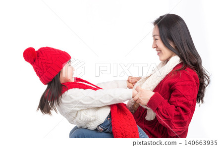 Playful Asian Mother and Daughter Having Fun Together at Home Playful Asian Mother and Daughter Having Fun Together at Home 140663935