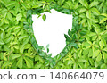 Horizontal tree bark background with shield made from green leaves. Safety, global ecological resource, go green concept. Environmental conservation, wildlife protection, Eco-friendly, Green energy 140664079