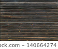 Texture of old wooden board of brown color. Horizontal or vertical background with weathered retro wood planks. Wall with pine boards trim. Texture of an aged wooden panels, its hue a deep brown 140664274