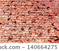 Full horizontal texture of an aged brick wall. The background texture is that of a retro brick wall 140664275
