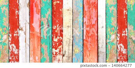 Texture of vintage wood board with cracked paint in various hues. Horizontal retro background with wooden plank with old paint of different color. Full pattern for banner or skinali with wood panels 140664277