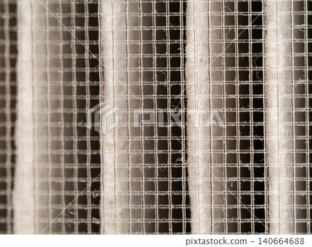 Surface of nylon mesh and filter paper in the dust filter Surface of nylon mesh and filter paper in the dust filter 140664688
