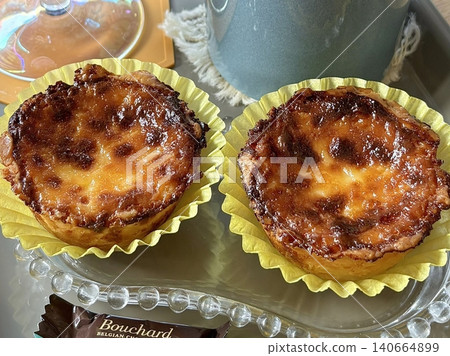 Golden egg tart with a flaky, buttery crust and a rich, creamy custard center. A deliciously satisfying treat for dessert or a light snack, blending texture and flavor perfectly. Golden egg tart with a flaky, buttery crust and a rich, creamy custard center. A deliciously satisfying treat for dessert or a light snack, blending texture and flavor perfectly. 140664899
