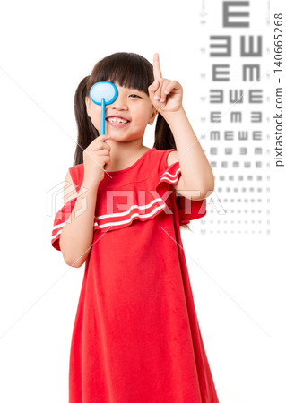 Asian little girl eye test, covering one eye, vision examination, child healthcare, ophthalmology concept 140665268