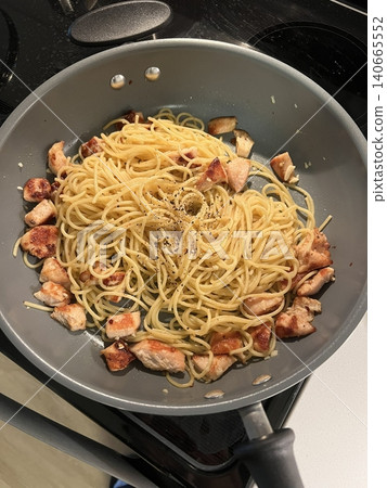Creamy spaghetti carbonara made with rich egg yolk sauce, crispy bacon, parmesan cheese, and freshly ground black pepper for a classic, indulgent Italian pasta dish. Creamy spaghetti carbonara made with rich egg yolk sauce, crispy bacon, parmesan cheese, and freshly ground black pepper for a classic, indulgent Italian pasta dish. 140665552
