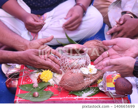 Performing Kalash puja rituals in Indian traditional wedding ceremony 140665699