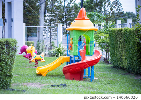 Children Colorful playground in the village very famous for children in there village. 140666020