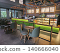 Modern coffee shop interior featuring a vibrant illuminated green service counter, stylish wooden bar. 140666040