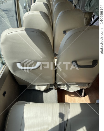 Interior of Shuttle Bus with Beige Leather Seats at Gubei Water Town 140666144