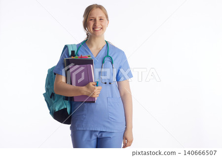Nursing Student with Notebooks and Backpack 140666507