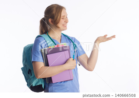 Nursing Student Presenting with Open Palm Gesture 140666508