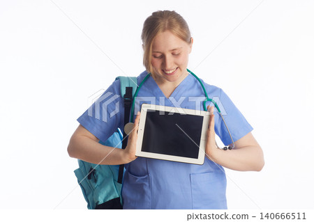 Female Healthcare Student Looking at Digital Tablet Screen Female Healthcare Student Looking at Digital Tablet Screen 140666511