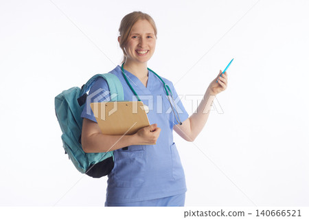 Confident Future Nurse Holding Clipboard and Pen Confident Future Nurse Holding Clipboard and Pen 140666521