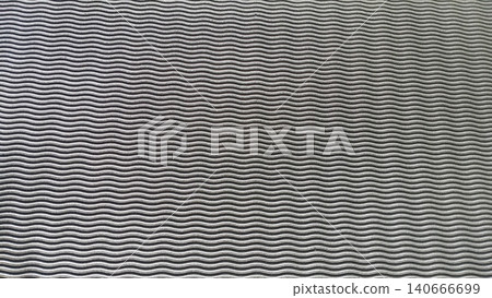 Close-up of textured EVA foam rubber surface, geometric wavy pattern. Close-up of textured EVA foam rubber surface, geometric wavy pattern. 140666699