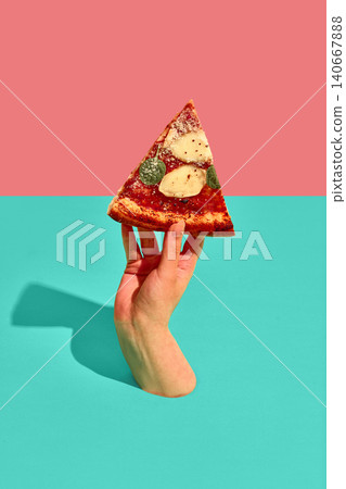 Hand holding single Margherita pizza slice against colorful geometric background. 140667888