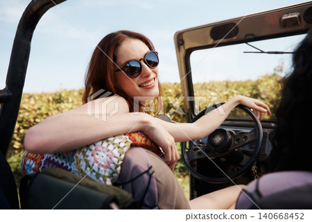 Women, care or bonding on road trip in countryside, talking or travel adventure for leisure in nature. Friends, driving and discussion in suv on summer holiday and happy together for tour in texas Women, care or bonding on road trip in countryside, talking or travel adventure for leisure in nature. Friends, driving and discussion in suv on summer holiday and happy together for tour in texas 140668452