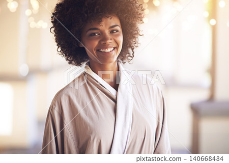 Spa, woman and portrait with smile in a bathrobe for wellness, cosmetics and beauty treatment. Health, skincare and resort with a relax African female person ready for dermatology at a hotel Spa, woman and portrait with smile in a bathrobe for wellness, cosmetics and beauty treatment. Health, skincare and resort with a relax African female person ready for dermatology at a hotel 140668484