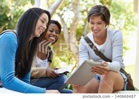 College, students and women with a tablet, outdoor and sunshine with smile and cooperation with online research. Friends, university and girls on break and tech for project, digital app and education 140668487