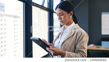 Window, tablet and business with woman, typing and internet with digital app and technology. Person, modern office and employee with website information and corporate with professional and research Window, tablet and business with woman, typing and internet with digital app and technology. Person, modern office and employee with website information and corporate with professional and research 140668660