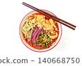 Vibrant purple sweet potato noodles served in a rich tomato sauce, topped with eggs and fresh lettuce 140668750