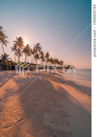 Tropical beach palm trees footprints soft sand. Vertical paradise shore bright summer sky. Sunny island escape gentle shadows sunset light, idyllic exotic holiday getaway Tropical beach palm trees footprints soft sand. Vertical paradise shore bright summer sky. Sunny island escape gentle shadows sunset light, idyllic exotic holiday getaway 140668784