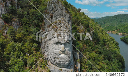 Statue of ancient dacian king Decebal on Danube river Statue of ancient dacian king Decebal on Danube river 140669172