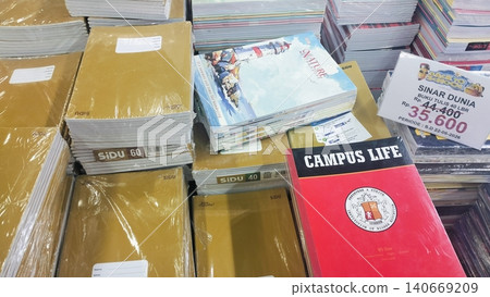 Stacks of school notebooks on display at a retail store Stacks of school notebooks on display at a retail store 140669209