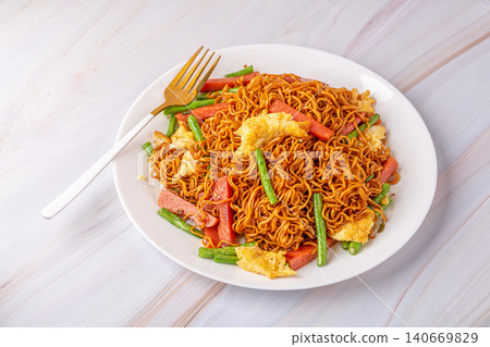 egg and Ham Fried Noodles - Classic Chinese Stir Fried Noodle Dish egg and Ham Fried Noodles - Classic Chinese Stir Fried Noodle Dish 140669829