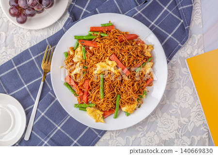 egg and Ham Fried Noodles - Classic Chinese Stir Fried Noodle Dish egg and Ham Fried Noodles - Classic Chinese Stir Fried Noodle Dish 140669830