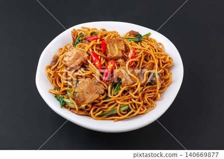 stir-Fried Noodles with Pork Belly and Vegetables, Chinese Chow Mein in White Bowl stir-Fried Noodles with Pork Belly and Vegetables, Chinese Chow Mein in White Bowl 140669877