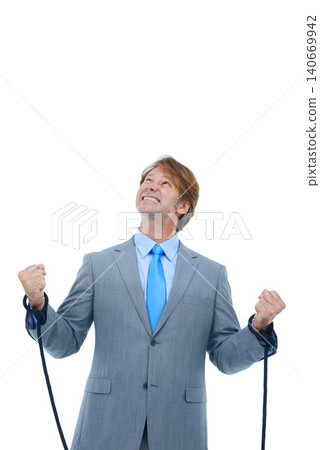Businessman, studio and frustrated with rope on hands for bondage or hostage with struggle or stress. Male person, tied up for corporate and prisoner for job or work, isolated and white background Businessman, studio and frustrated with rope on hands for bondage or hostage with struggle or stress. Male person, tied up for corporate and prisoner for job or work, isolated and white background 140669942