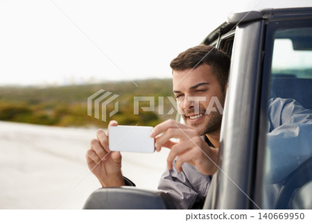 Road trip, man and cellphone for photography in car, game route and sightseeing for driving for journey. Person, traveller and exploration on holiday in nature, street and leisure in vehicle in oman Road trip, man and cellphone for photography in car, game route and sightseeing for driving for journey. Person, traveller and exploration on holiday in nature, street and leisure in vehicle in oman 140669950