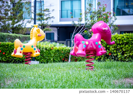 Plastic rocking horse toy colourful yellow and pink. Plastic rocking horse toy colourful yellow and pink. 140670137
