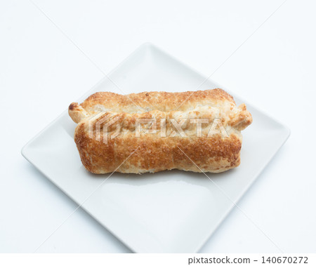 a pie on a white plate on a white background a pie on a white plate on a white background 140670272